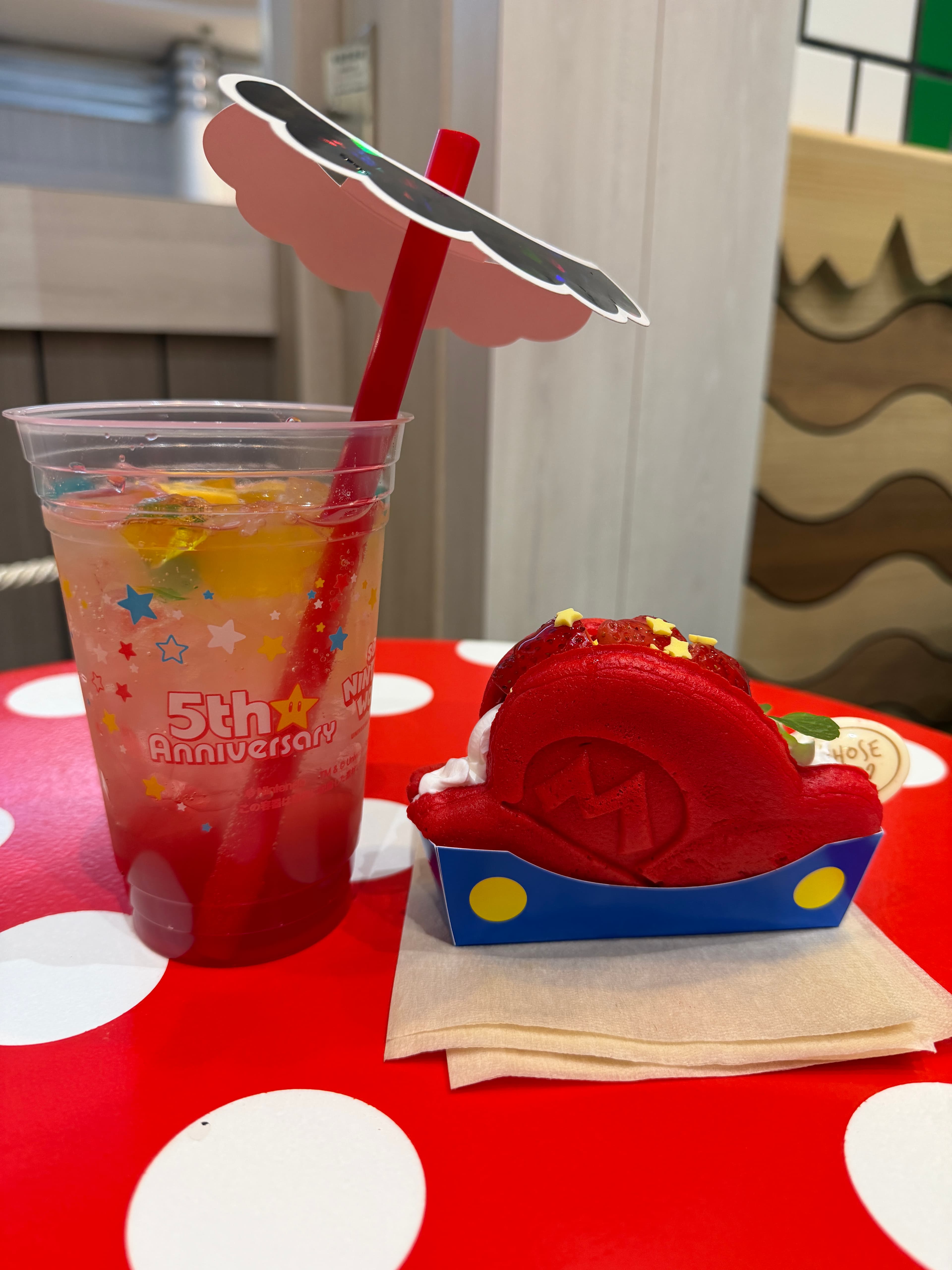 a mario drink and strawberry sandwich